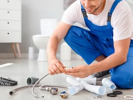 Plumber assembling fittings
